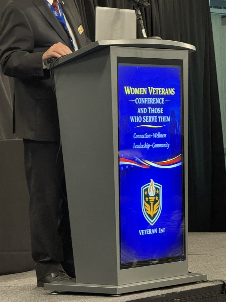 Women Veterans Conference 2026 — Conference podium closeup