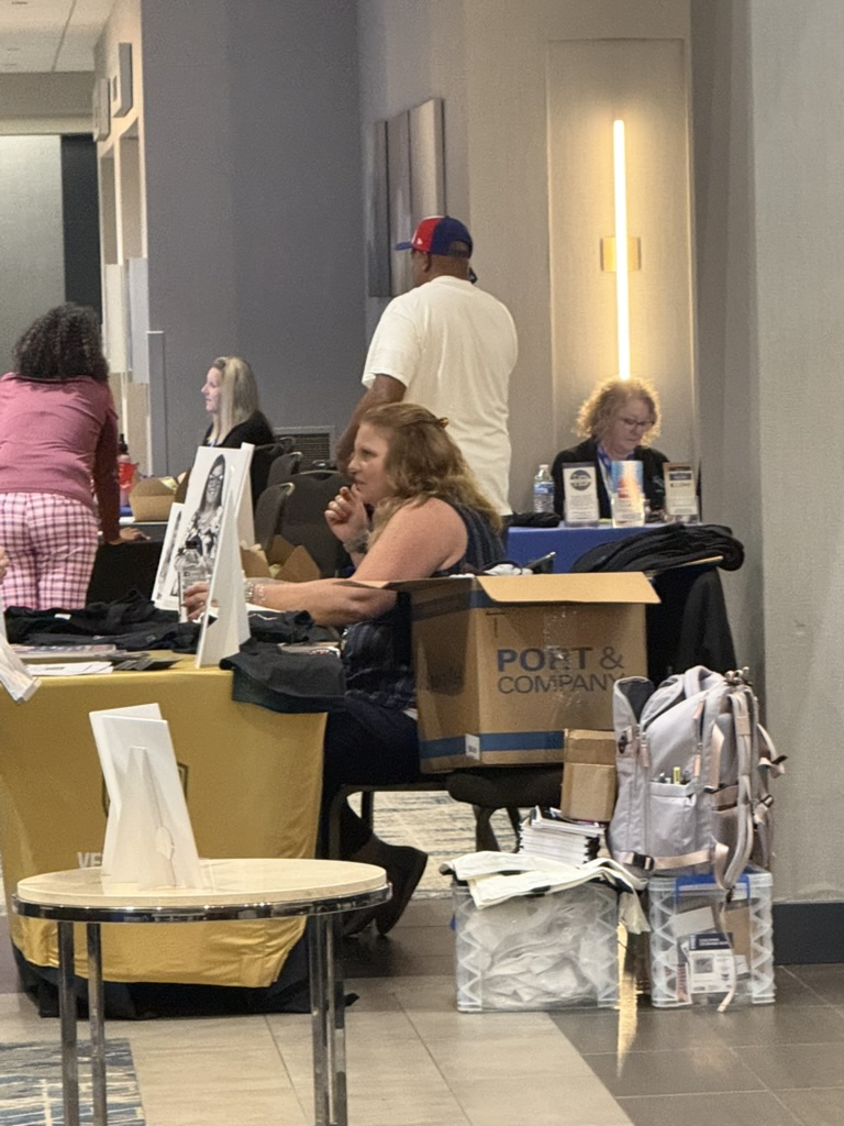 Women Veterans Conference 2026 — Vendor merchandise table