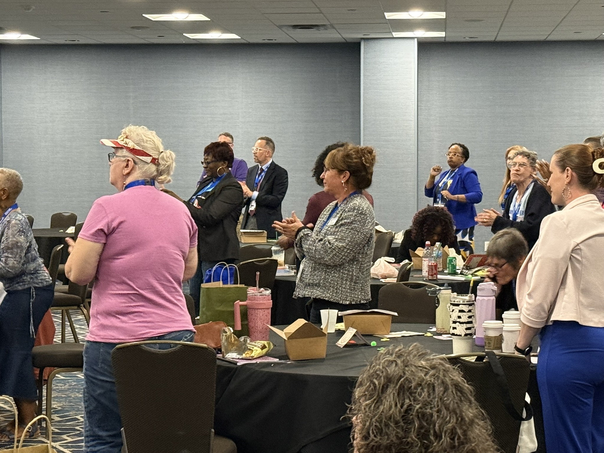 Women Veterans Conference 2026 — Attendees standing applause