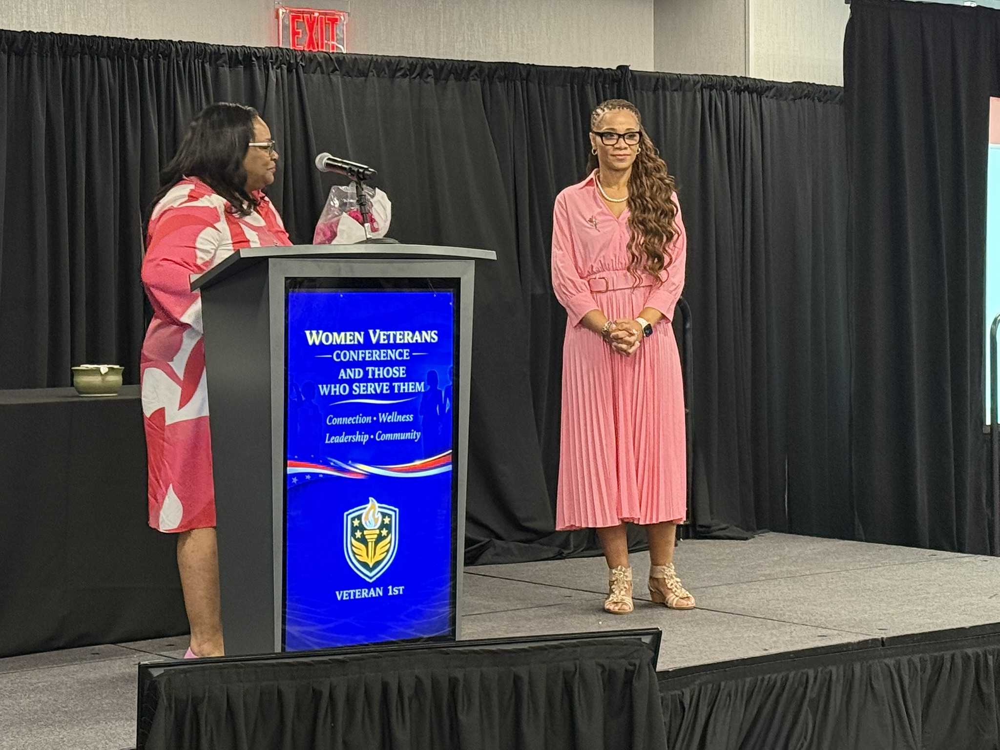 Women Veterans Conference 2026 — Two speakers on stage
