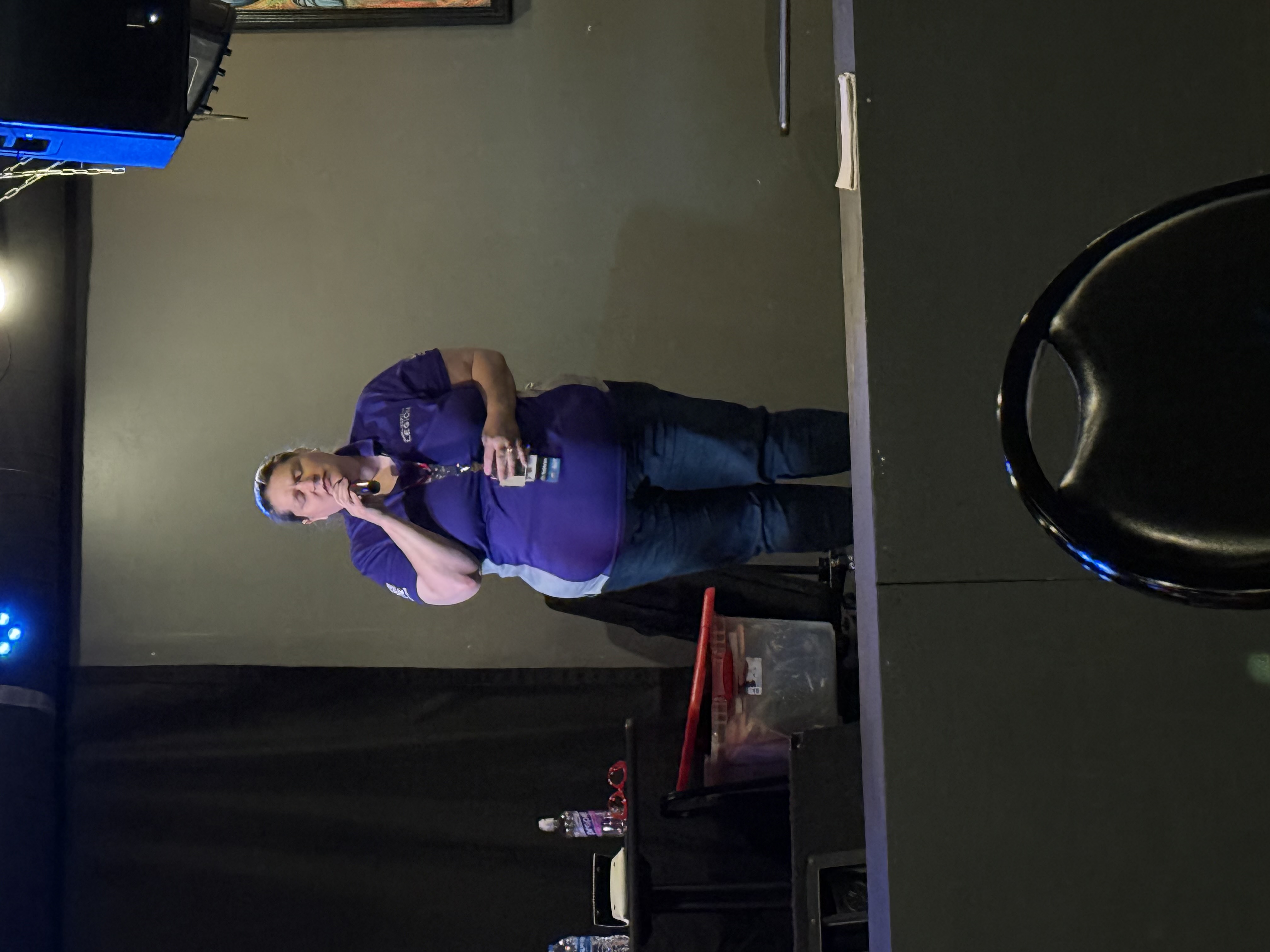 Women Veterans Conference 2026 — Speaker with microphone
