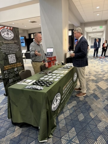 Women Veterans Conference 2026 — Vendor booth conversation