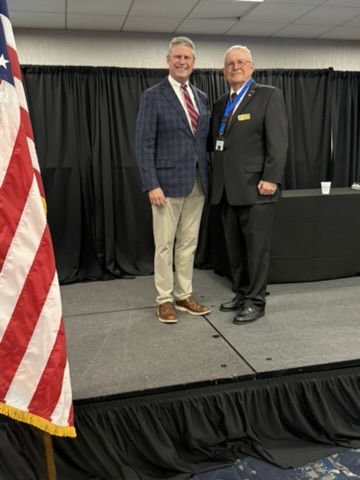 Women Veterans Conference 2026 — Stage photo flag
